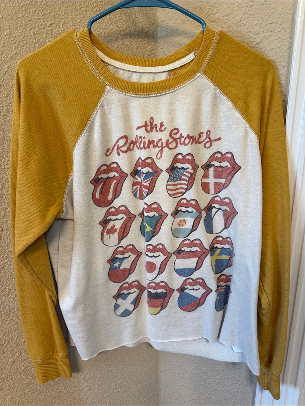 the Rolling Stones Women’s Long Sleeve Raglan Tee - Mustard & White